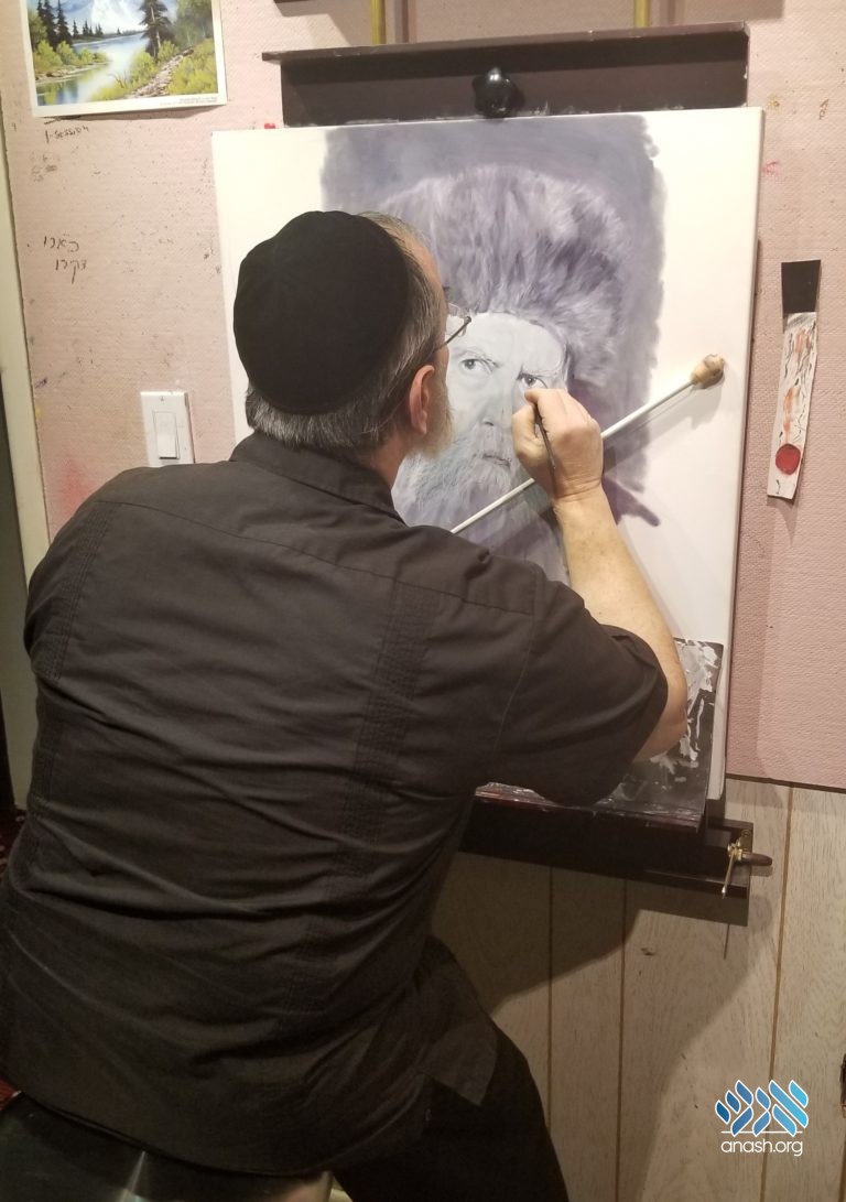 Shlomo at work on the painting. 