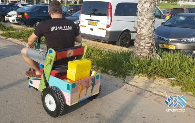 A missionary rides his three-wheeled bike and distributes gifts.