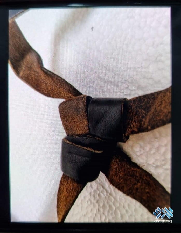 First-Time Photos of Rebbe's Tefillin Knots Show Unique Details